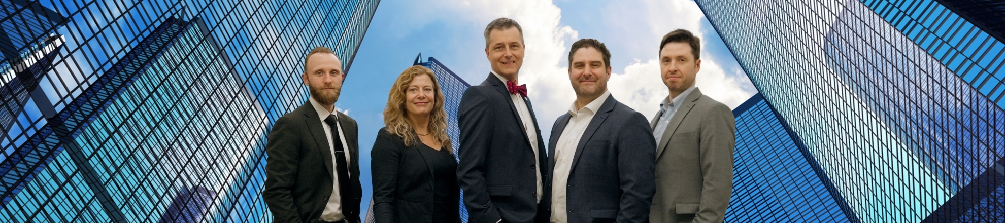 791323/Team Photo_building bg2_1980x440.jpg